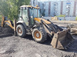 Услуги спецтехники для разравнивания грунта и насыпи стоимость услуг и где заказать - Владивосток